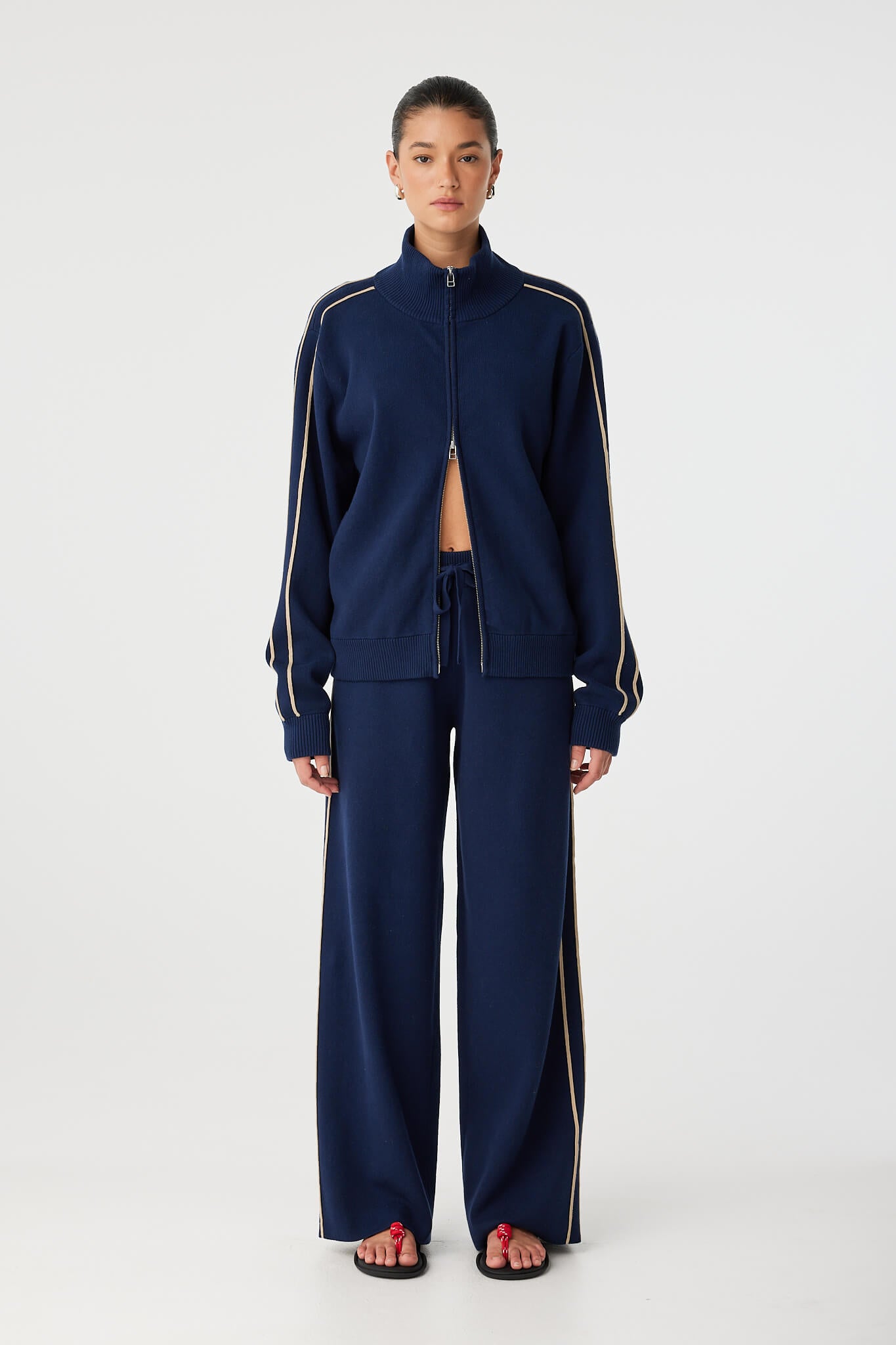 Full-length view of Rome Jacket in navy organic cotton blend with relaxed silhouette.