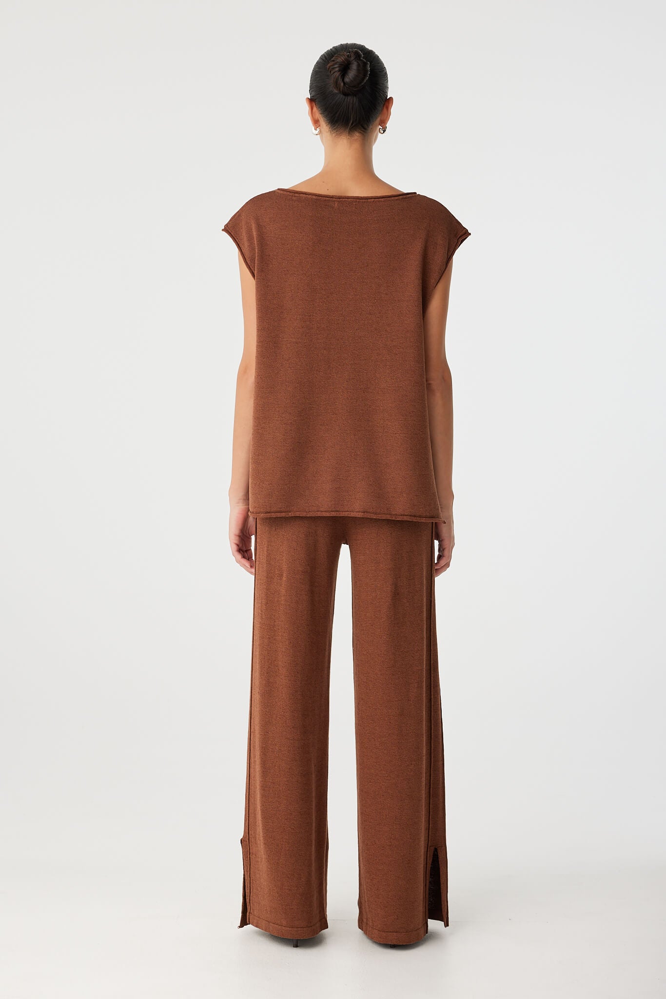 Back view of clay tie side top in linen blend with loose, breezy silhouette.