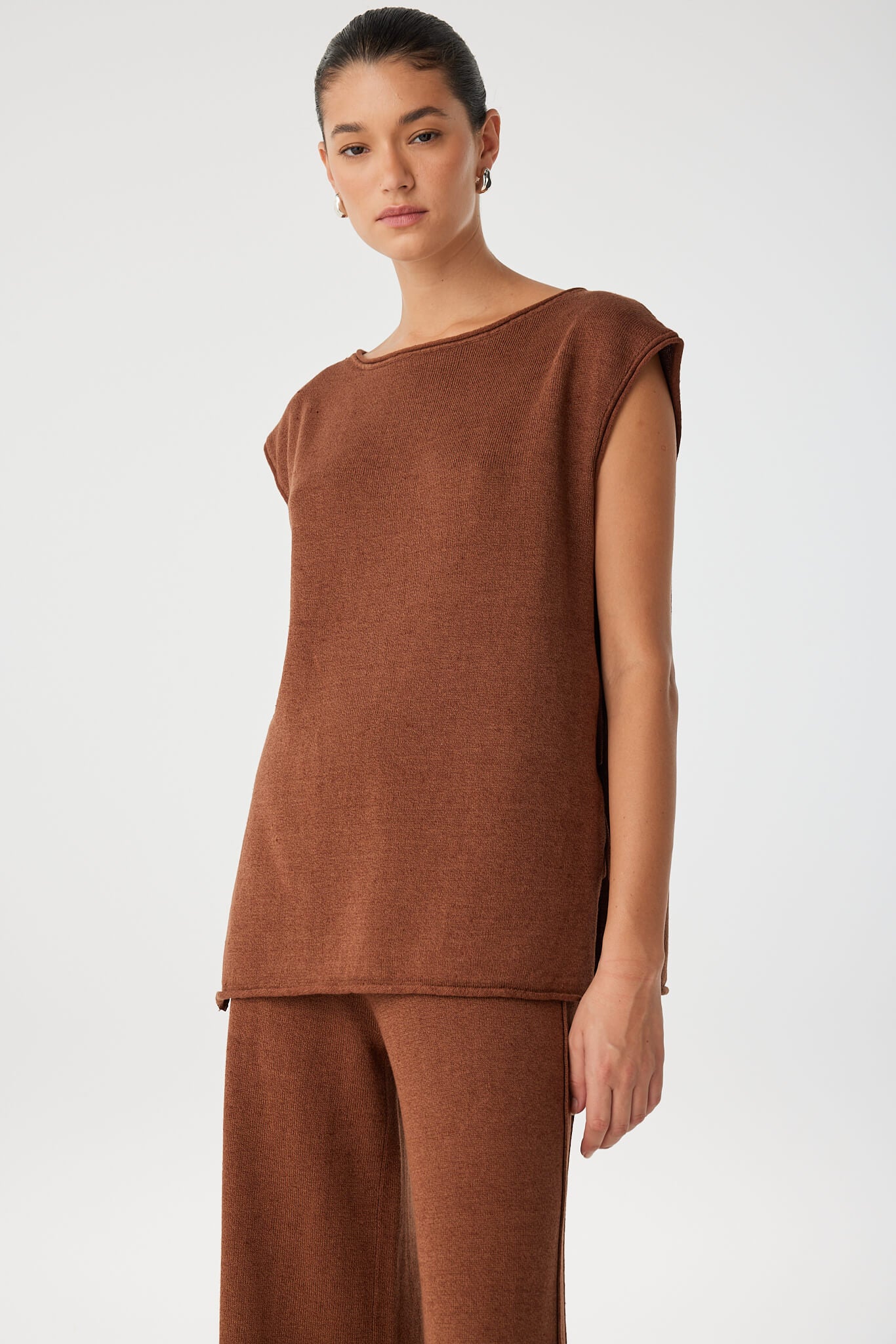 Close-up of neckline and side tie on lightweight clay linen top.