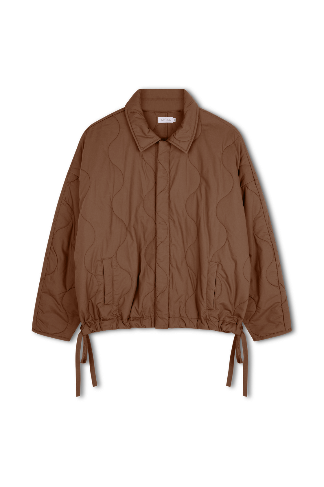 Quilted cotton jacket in espresso brown with cocoon sleeves and drawstring hem.
