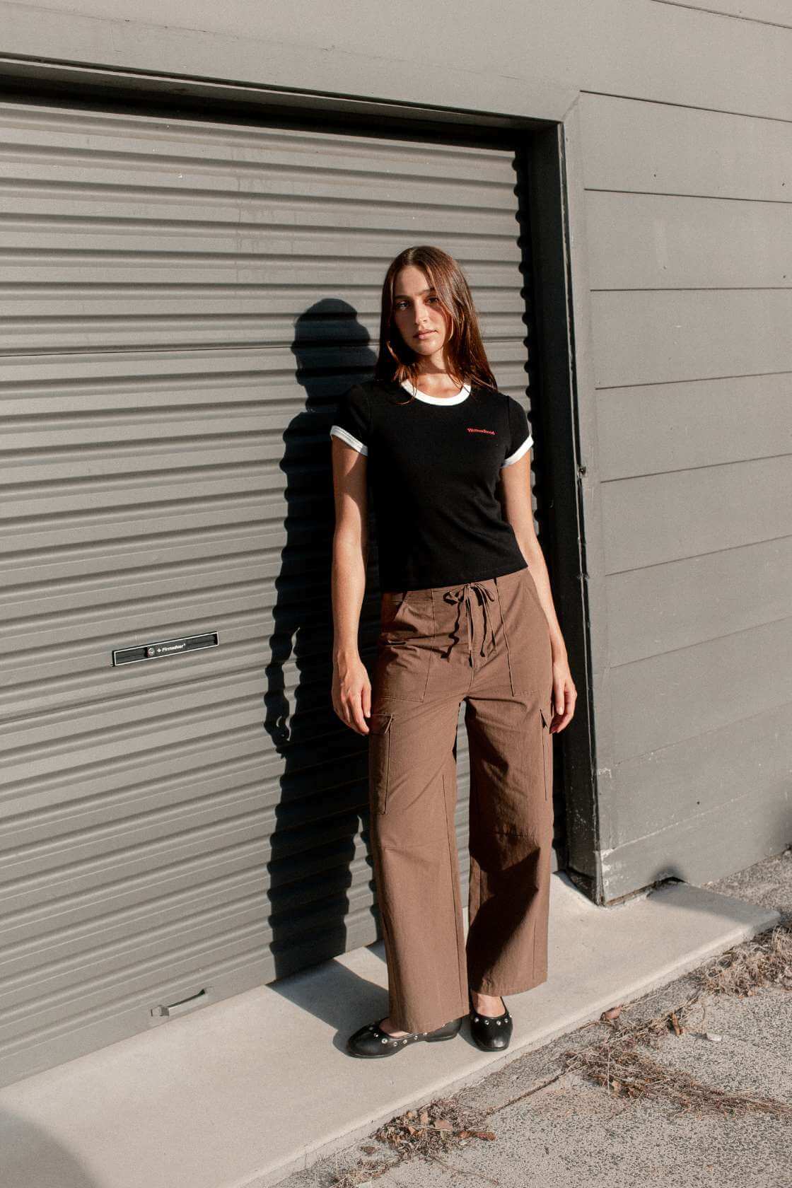 Black cropped ringer baby tee with off white binding