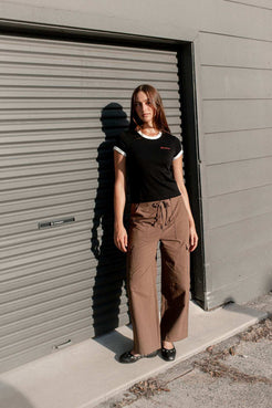 Black cropped ringer baby tee with off white binding