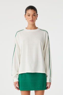 Front view of Pippa Long Sleeve in cream with green contrast stripe and relaxed silhouette.