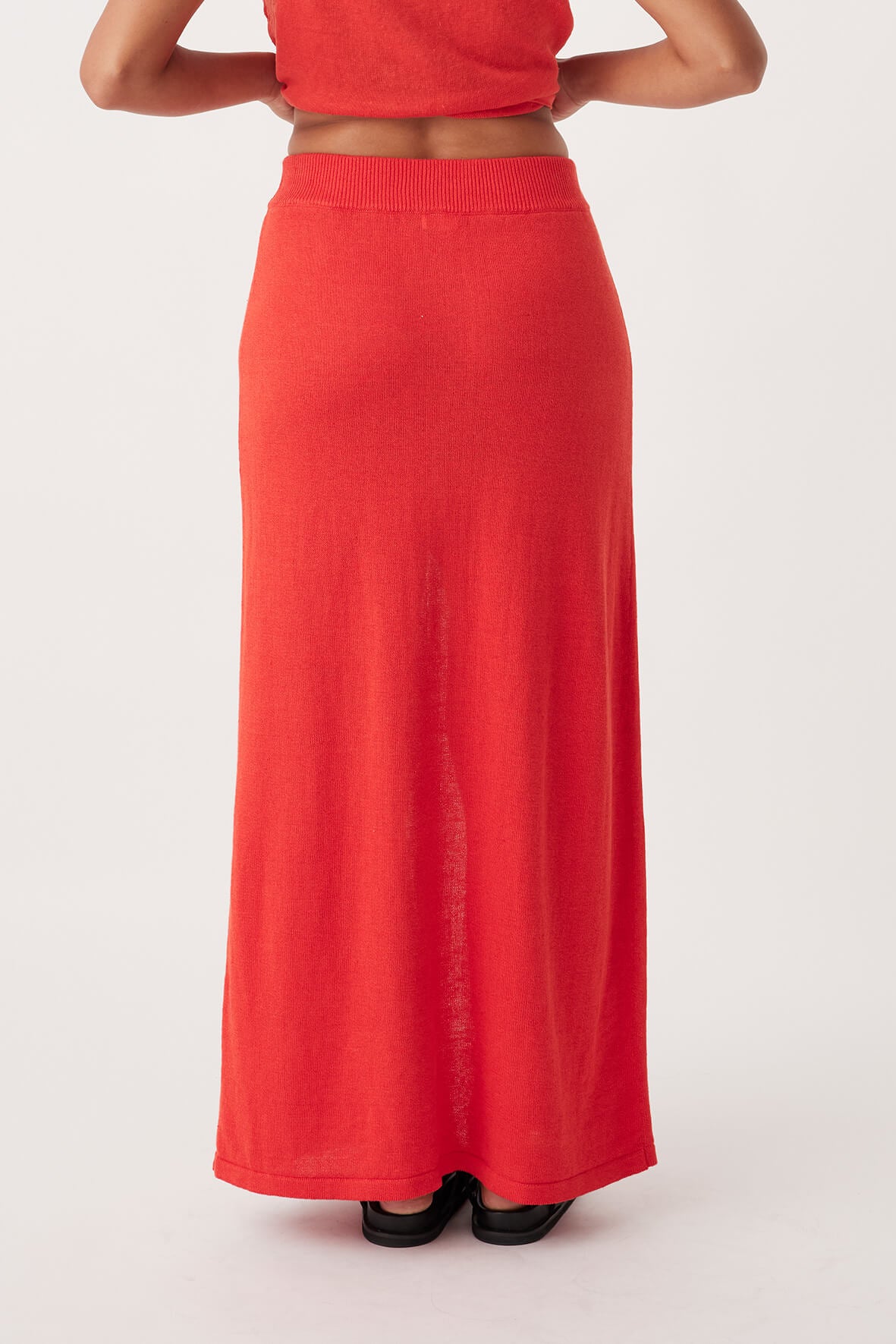 Back view of Poppy Skirt in hibiscus, ethically produced A-line design, made from lightweight organic cotton-linen blend.