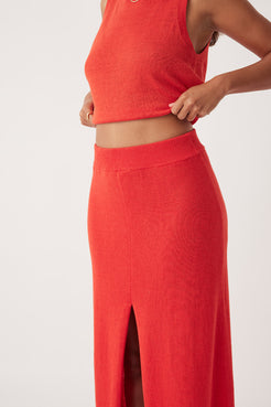 Close-up view of the Poppy Skirt in hibiscus, featuring a comfortable A-line silhouette with centre front split, made from lightweight organic cotton-linen blend for sustainable style.