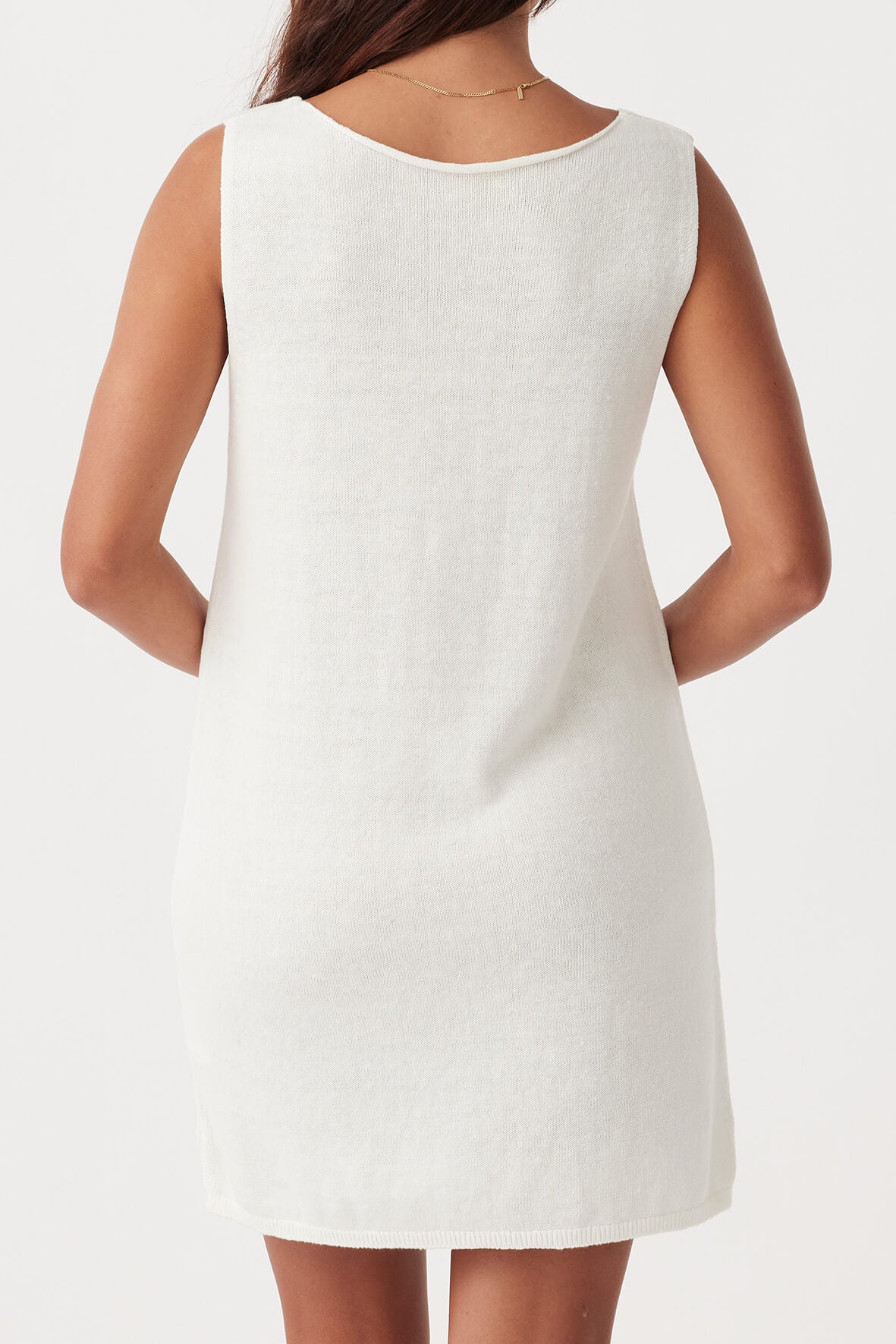 Back view of Poppy Mini Dress in cream, featuring relaxed silhouette and ethically produced from sustainable cotton-linen fabric.