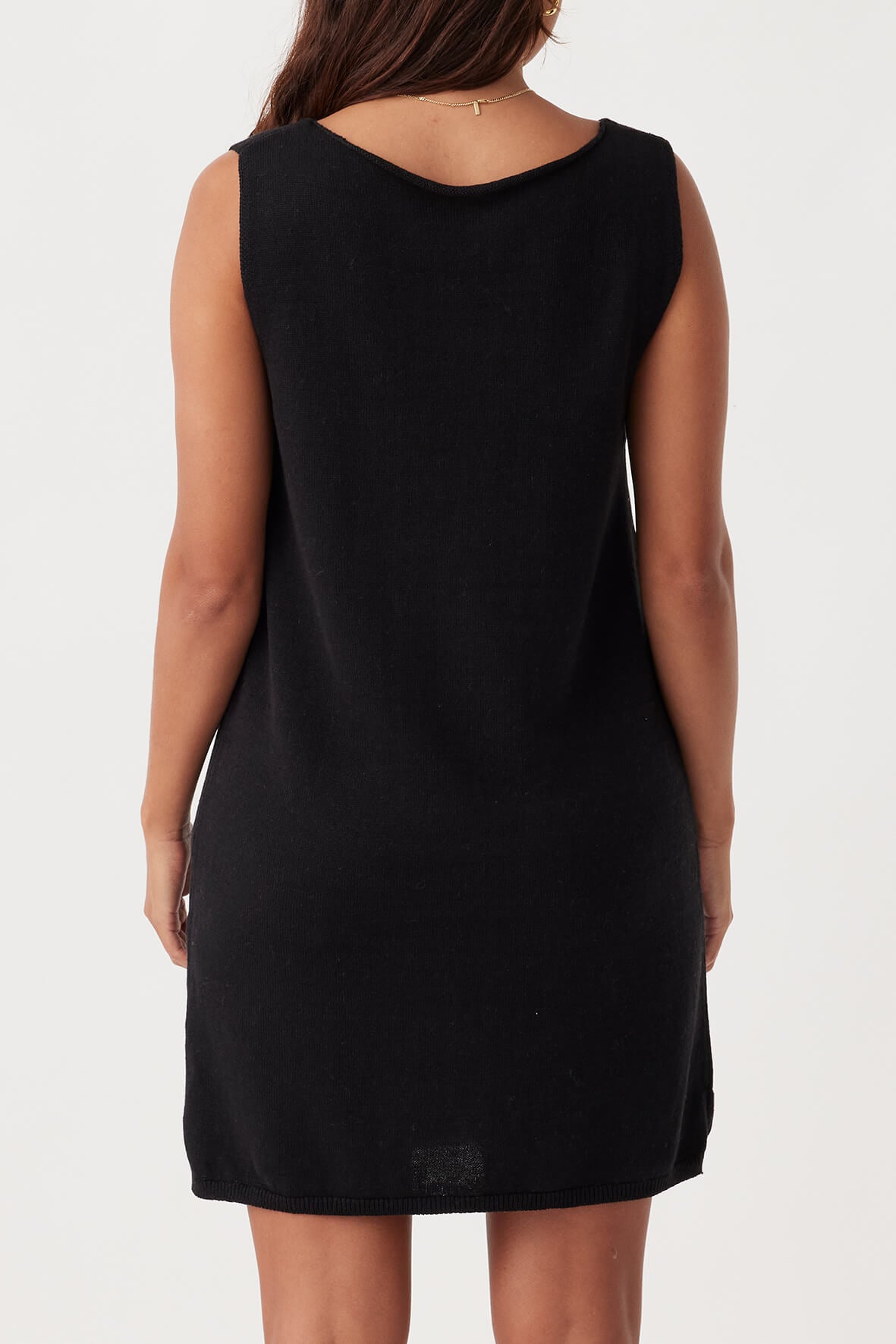 Back view of the Poppy Mini Dress in Black, showing its relaxed fit and minimalist design.