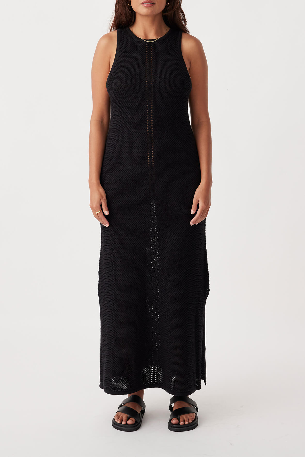 Front view of Sloane Dress in black, A-line style with high neck and open knit detail at the centre front, made from organic cotton-linen blend.