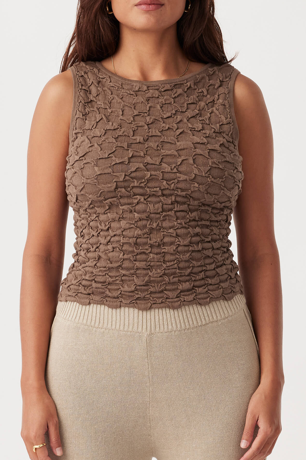 Front view of Mila Tank in cacao, featuring reversible high and scoop neck options with textured bubble knit, made from 100% organic cotton