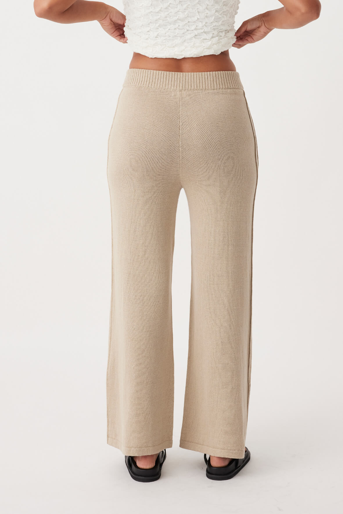 Back view of Poppy Pant, ethically produced with a relaxed fit and sustainable organic cotton-linen fabric.