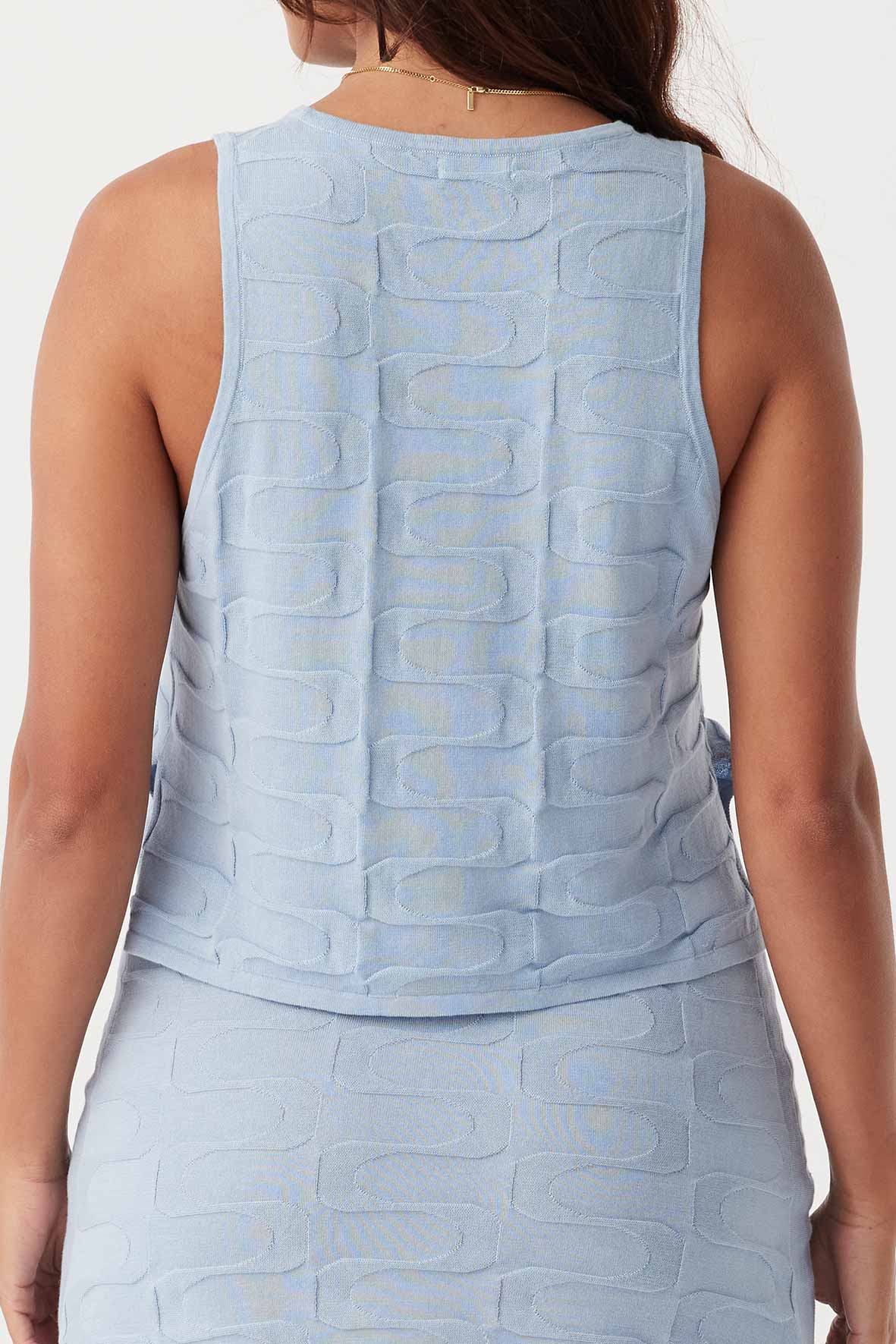 Back view of Lara Tank in sky, ethically produced with lightweight jacquard knit, featuring a cropped silhouette and sustainable materials.