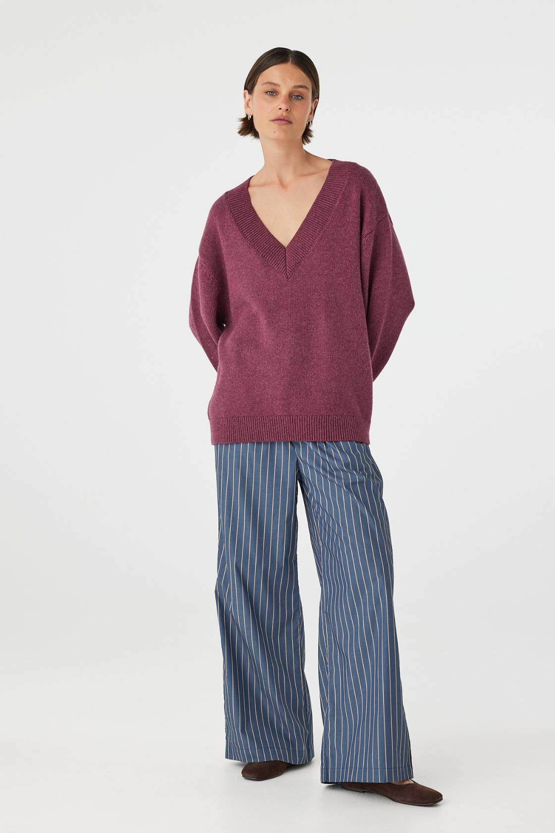 Full body front view of merlot sweater with relaxed silhouette