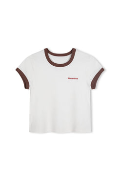 Off white and chocolate Womanhood baby tee, front view