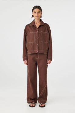 Full body front view of brown jacket with matching pants