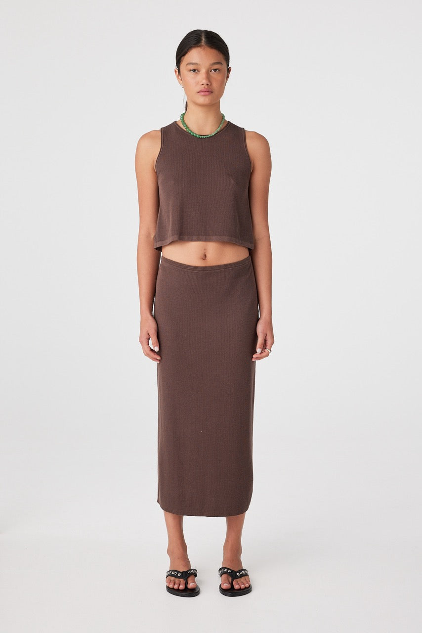 Front view of model wearing espresso organic cotton hemp rib tank with matching midi skirt