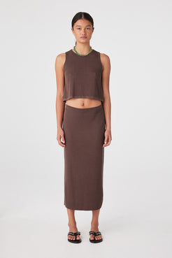 Front view of model wearing espresso rib longline skirt with matching tank