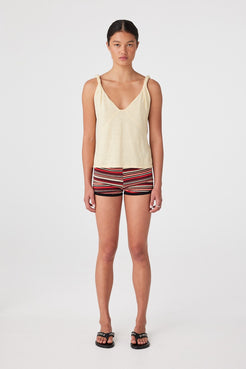 Model in high-waisted cotton knit shorts in Flame Stripe with wide leg and soft waistband