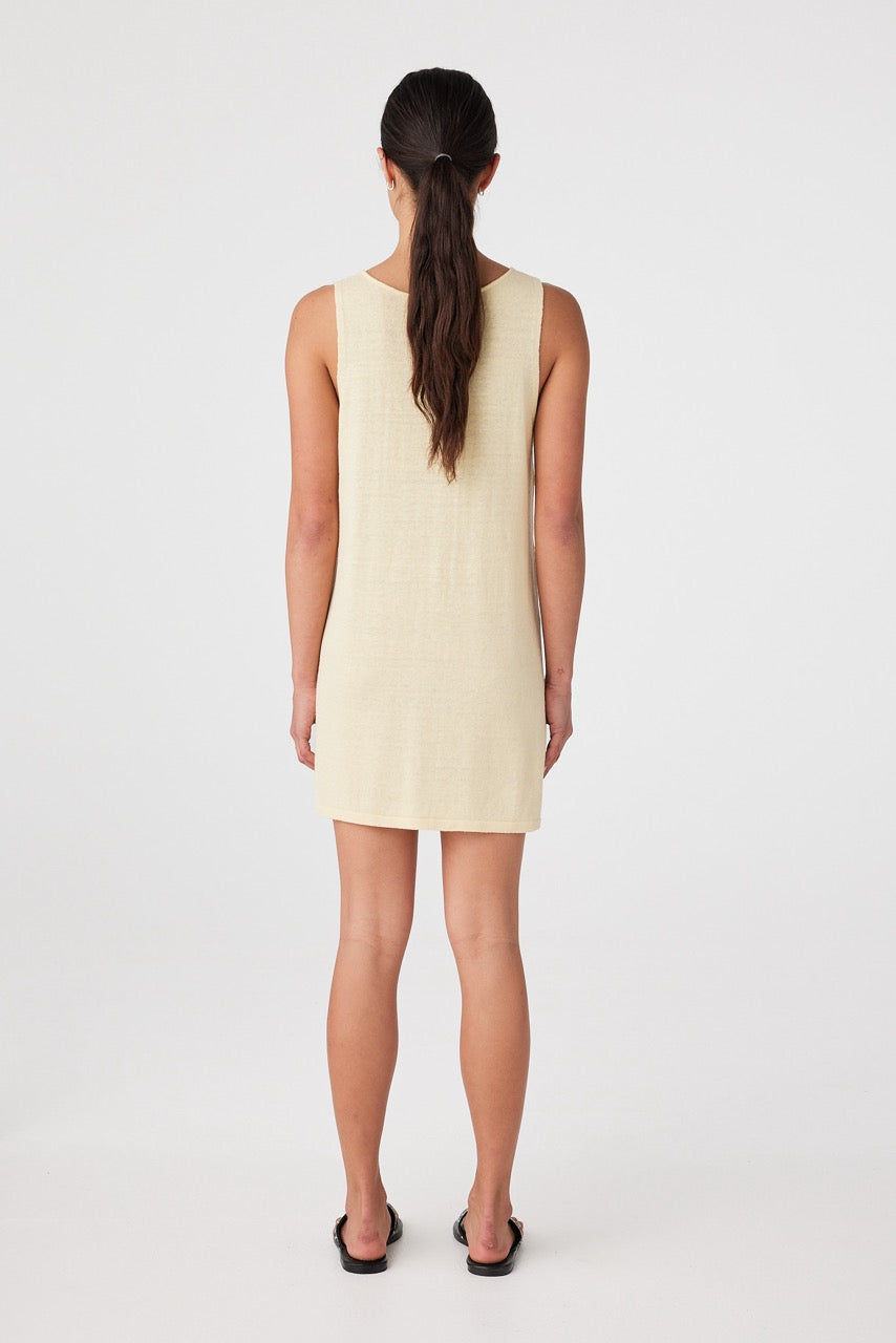 Back view of butter sleeveless mini dress in soft linen organic cotton fabric