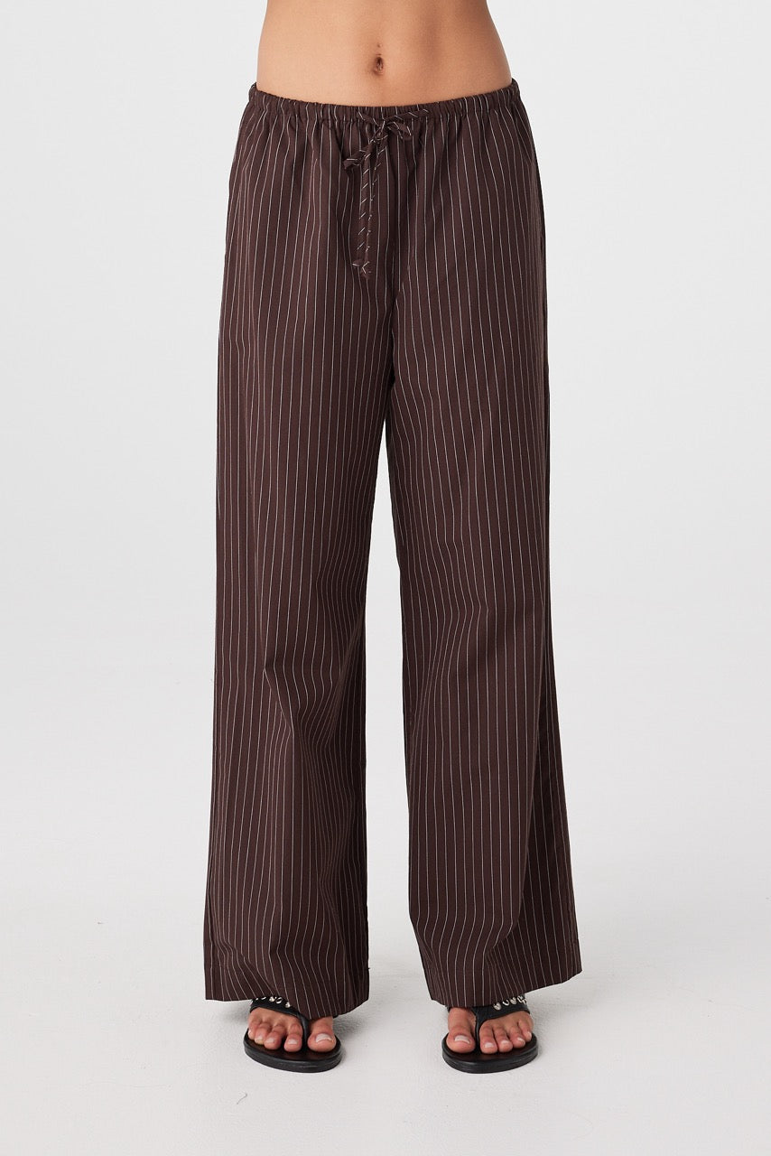 Front view of straight-leg cotton pants in espresso stripe with elastic waistband and drawcord