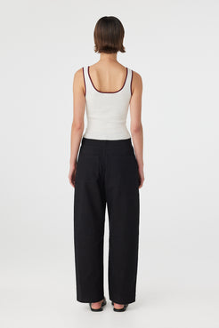 Back view of Kaya Tank cream and merlot, organic cotton knit tank showing clean back line and contrast binding.