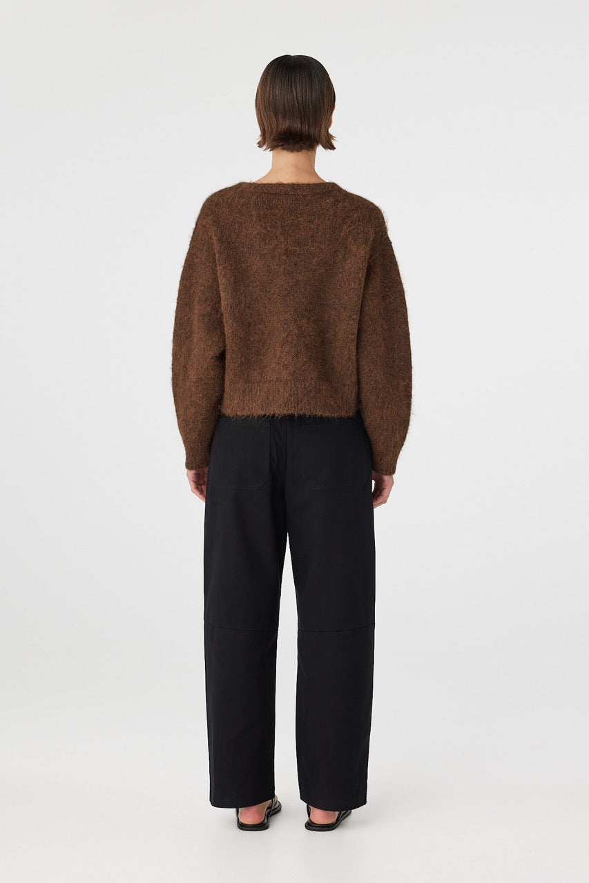 Back view of brown cardigan with ribbed hem and cuffs