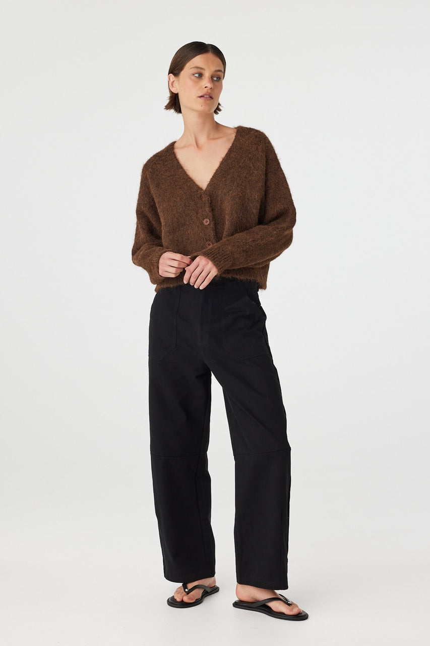 Angled front view of brown cardigan with button front detail