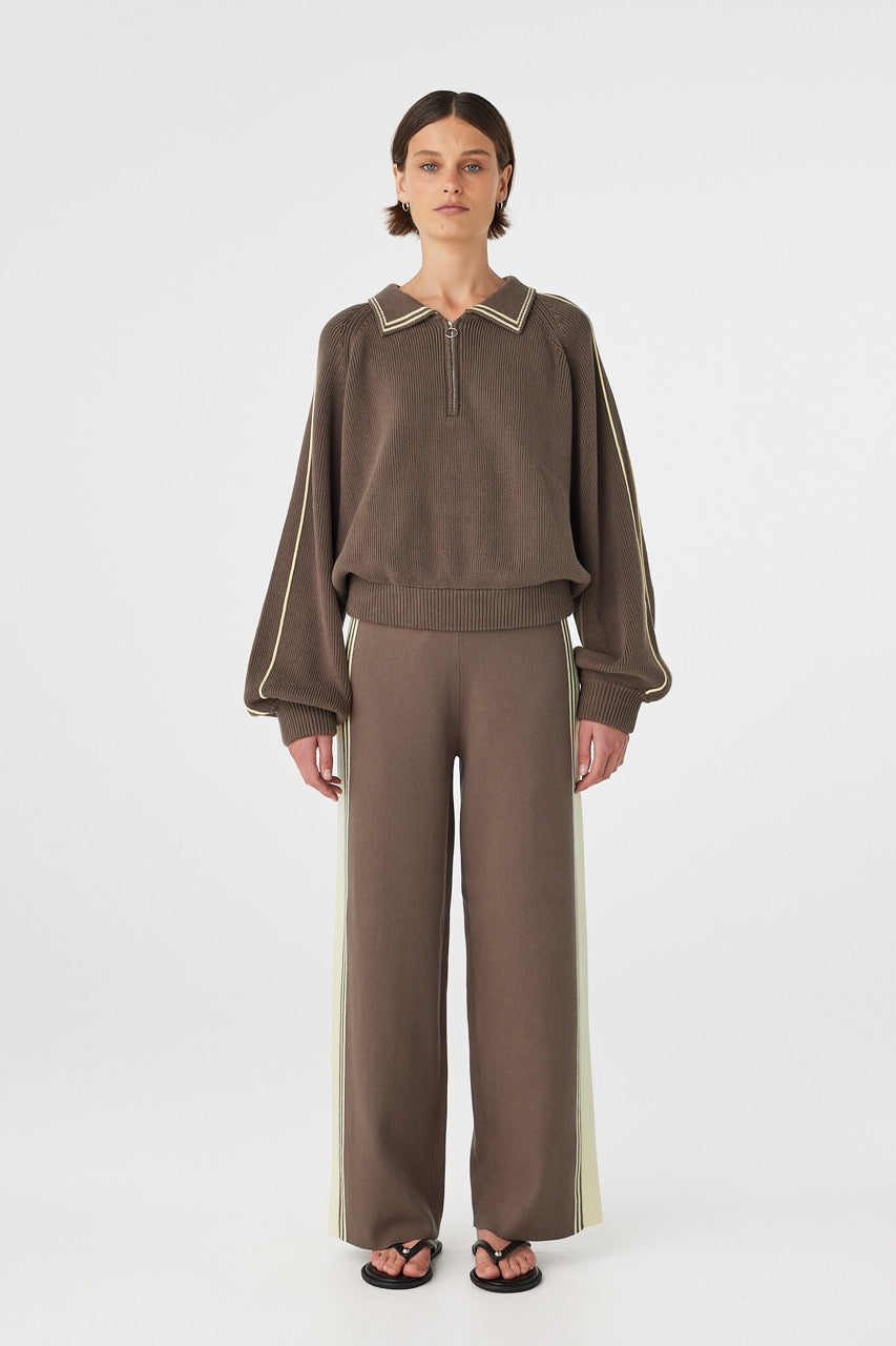 Full body front view of brown sweater with matching pants and relaxed fit