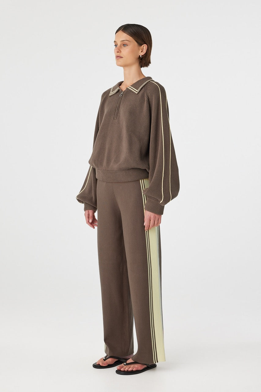 Full body side view of Emery Pant, high-rise straight leg pants with ribbed waistband and drawcord tie.