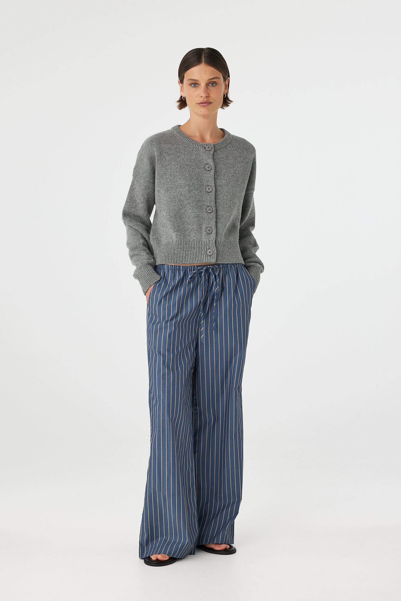 Bobby Cardigan grey marle styled open, relaxed crew-neck knit with button front and ribbed trims, front view.