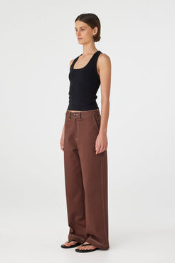 Side view of Sable Top in black, slim-fit scoop neck tank with racerback cut.
