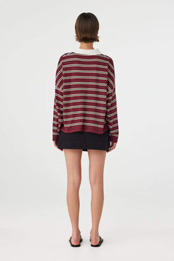 Back view of Eames Mini Skirt black, cotton mini skirt showing clean back silhouette.