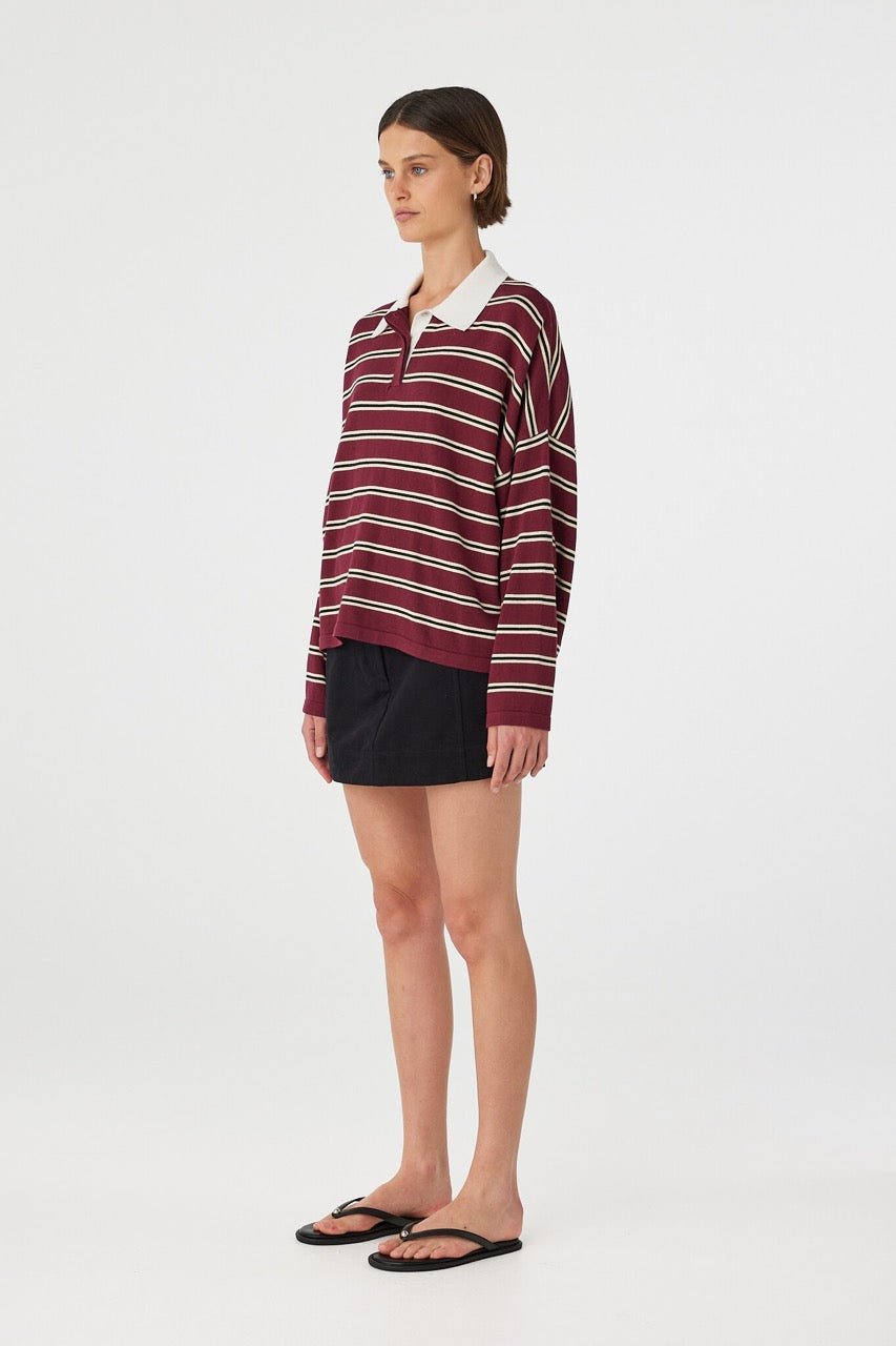 Side view of Rayne Knit Jersey merlot stripe, relaxed oversized polo knit showing dropped shoulder fit.