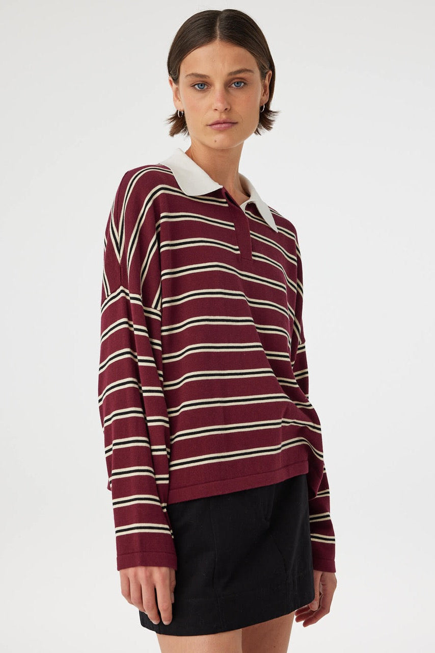 Rayne Knit Jersey merlot stripe styled with mini skirt, oversized polo knit silhouette with relaxed sleeves, outfit view.