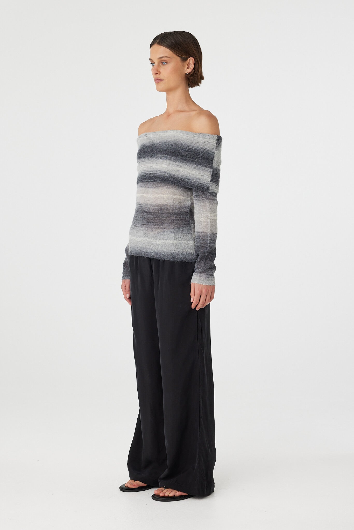 Nikki off the shoulder top in grey ombre knit shown in side profile, highlighting the double layer foldover neckline and slim long sleeves