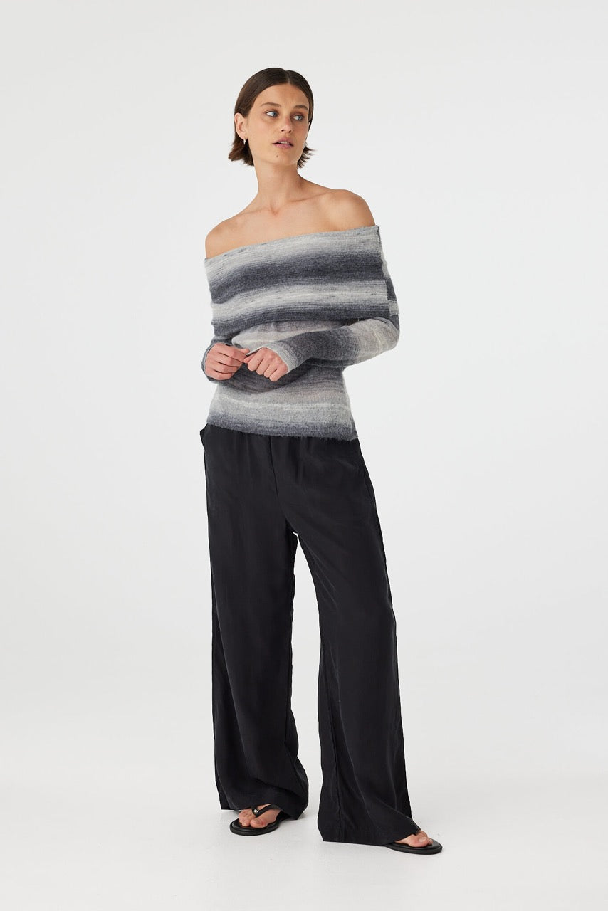 Nikki off the shoulder top in grey and cream ombre worn slightly angled, showcasing the natural drape and fine knit texture