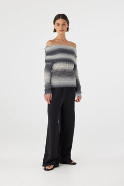 Nikki off the shoulder top in grey and cream ombre worn slightly angled, showcasing the natural drape and fine knit texture