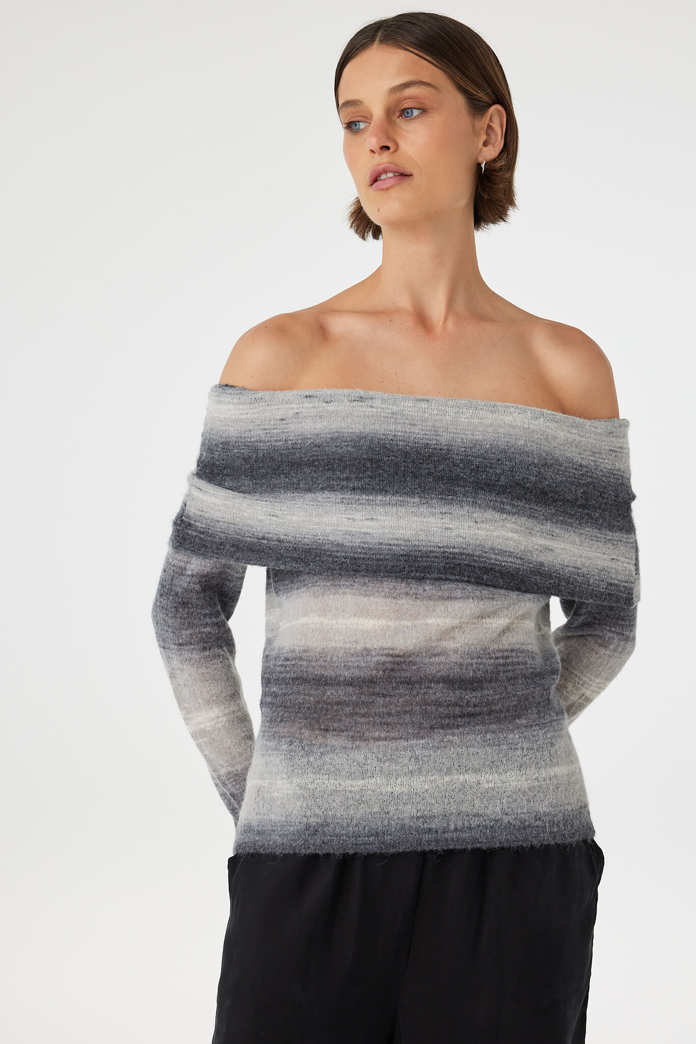 Nikki off the shoulder top in grey ombre knit close-up, featuring a soft fuzzy finish, sheer layering and horizontal colour gradient