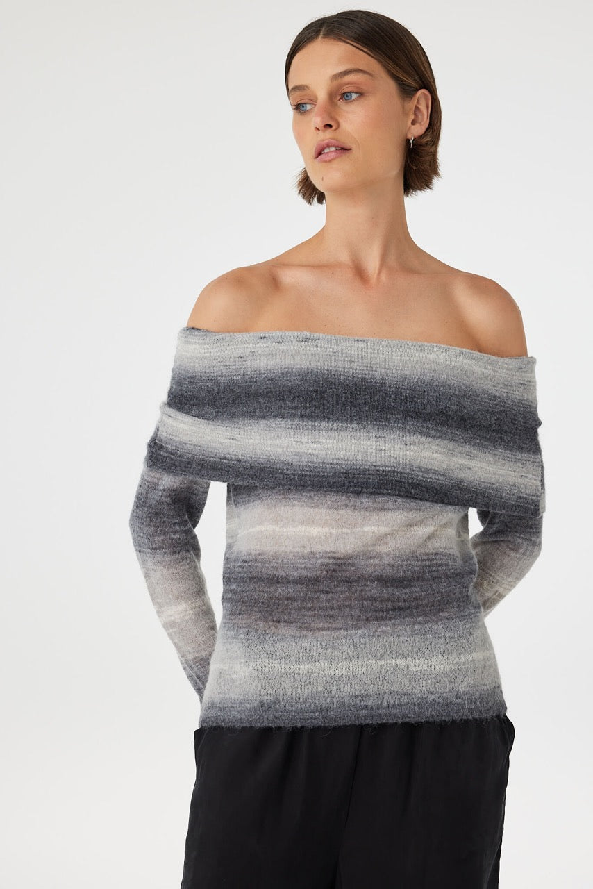 Nikki off the shoulder top in grey and cream ombre styled off one shoulder, highlighting the clean neckline and lightweight knit construction