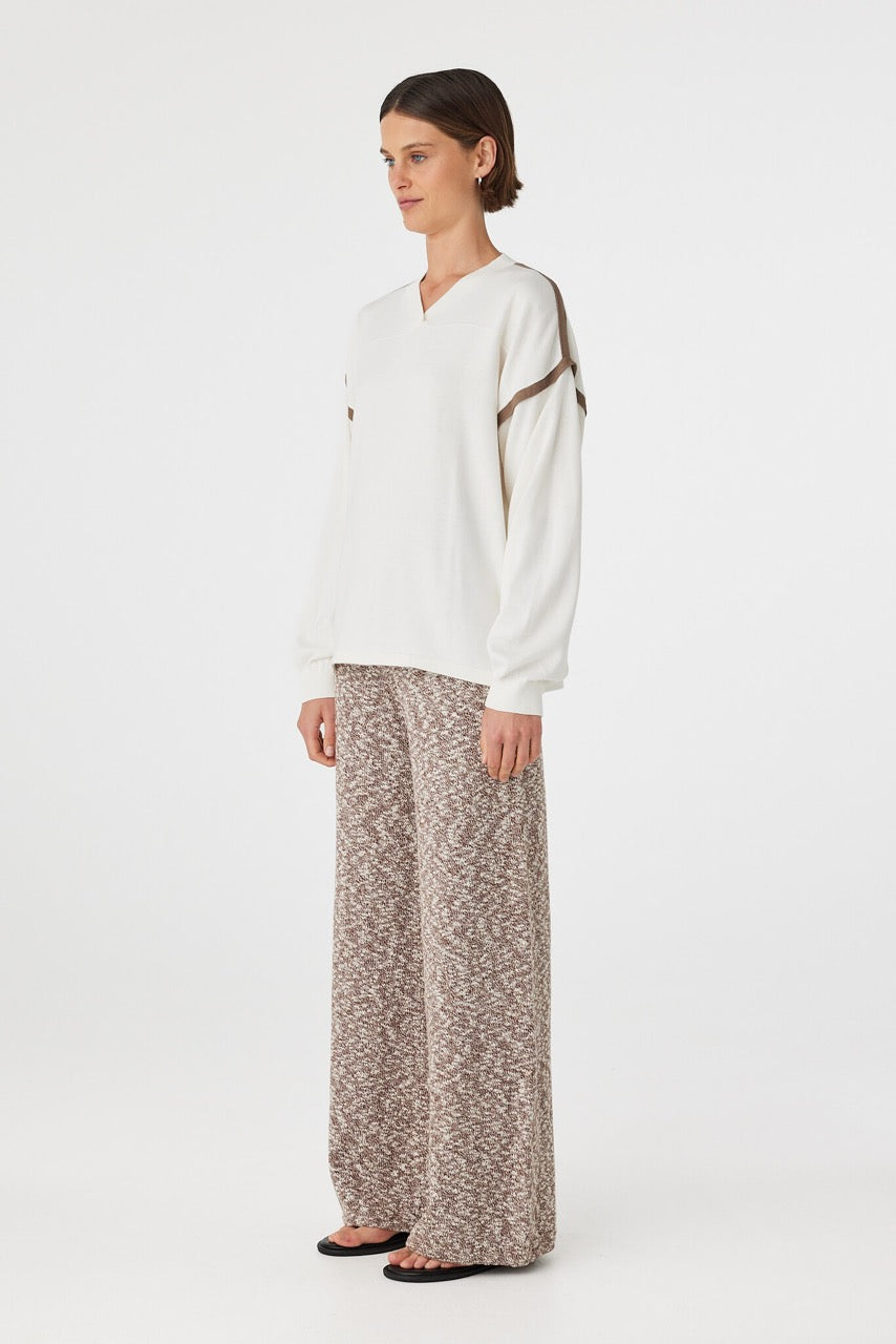 Emmet Pant chocolate & cream side profile showing relaxed straight leg silhouette and soft drape styled with cream top and sandals