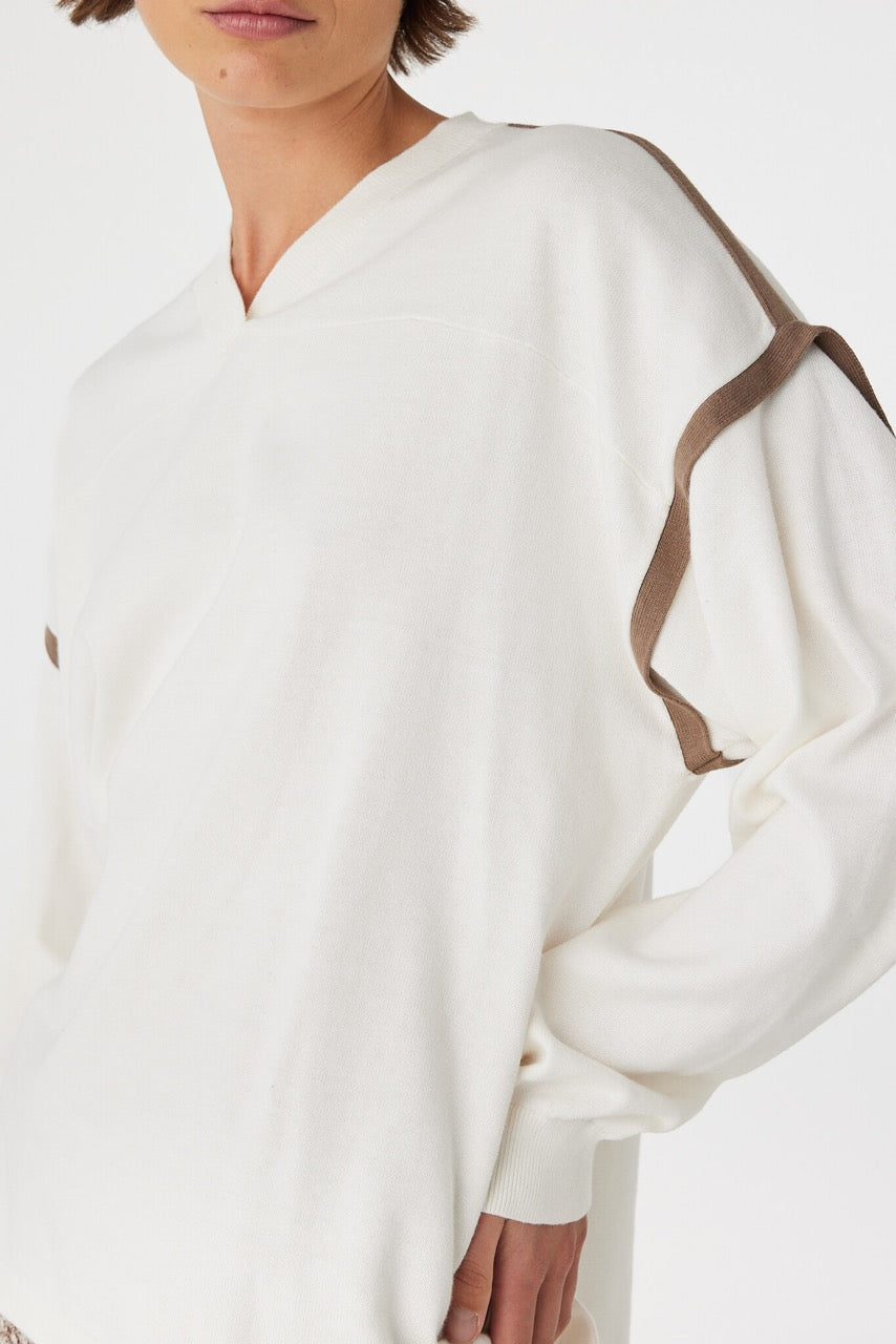Eden long sleeve tee in cream and espresso detailed close-up, focusing on shoulder seam and contrast trim