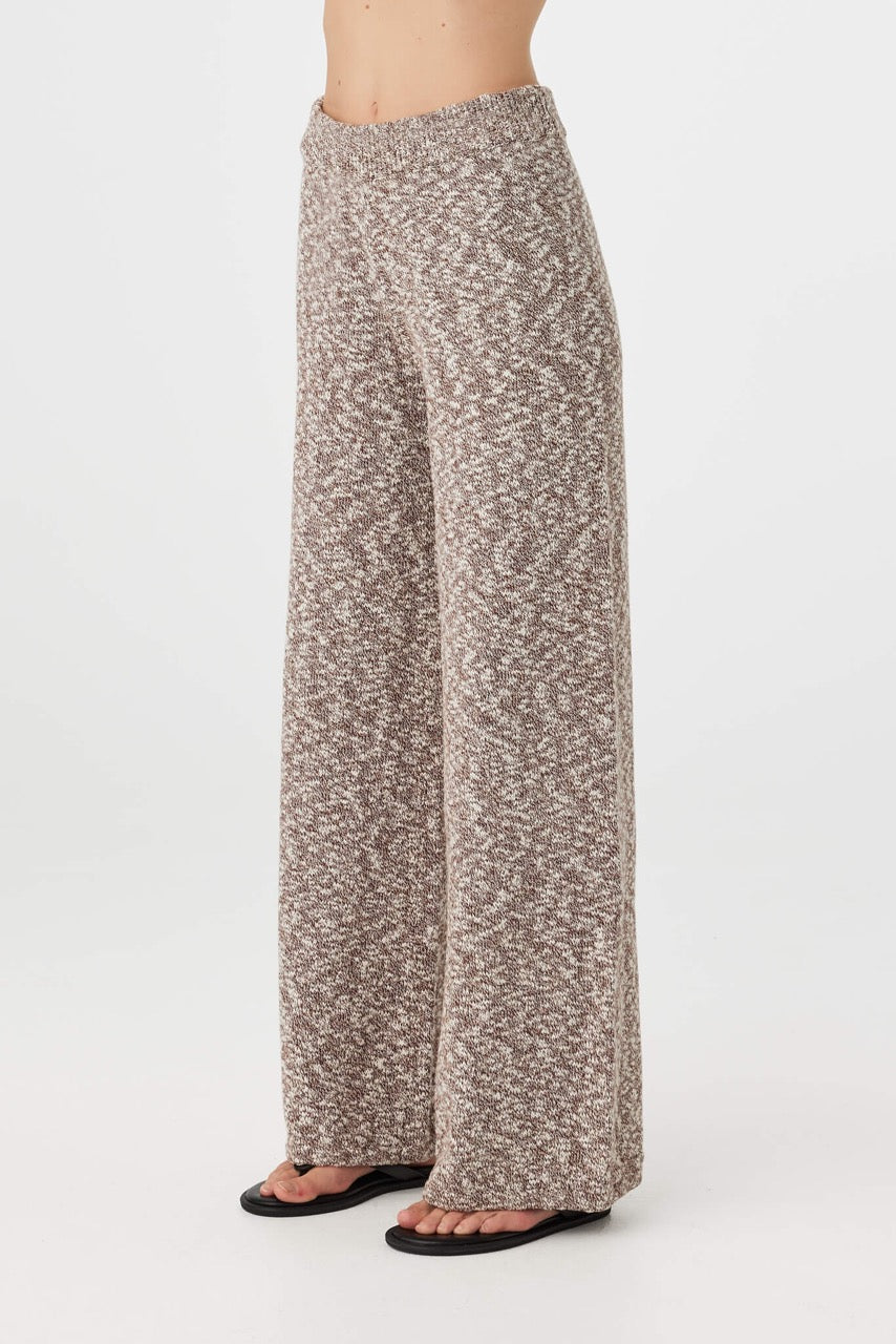 Emmet Pant chocolate & cream side profile showing relaxed straight leg silhouette and soft drape styled with cream top and sandals