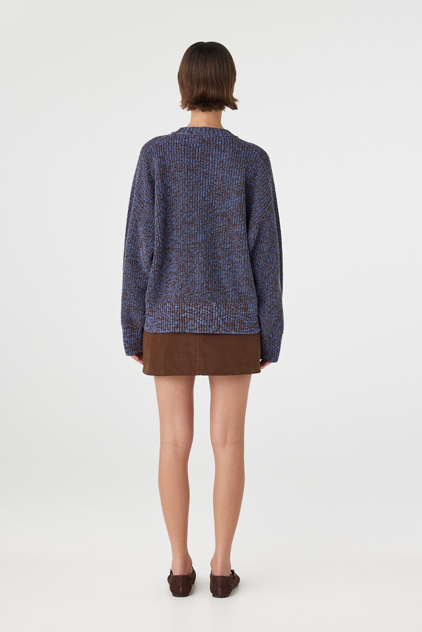 Solene sweater in chocolate and royal blue viewed from back, featuring a clean oversized shape, ribbed hem and sleeves in a chunky mottled cotton knit