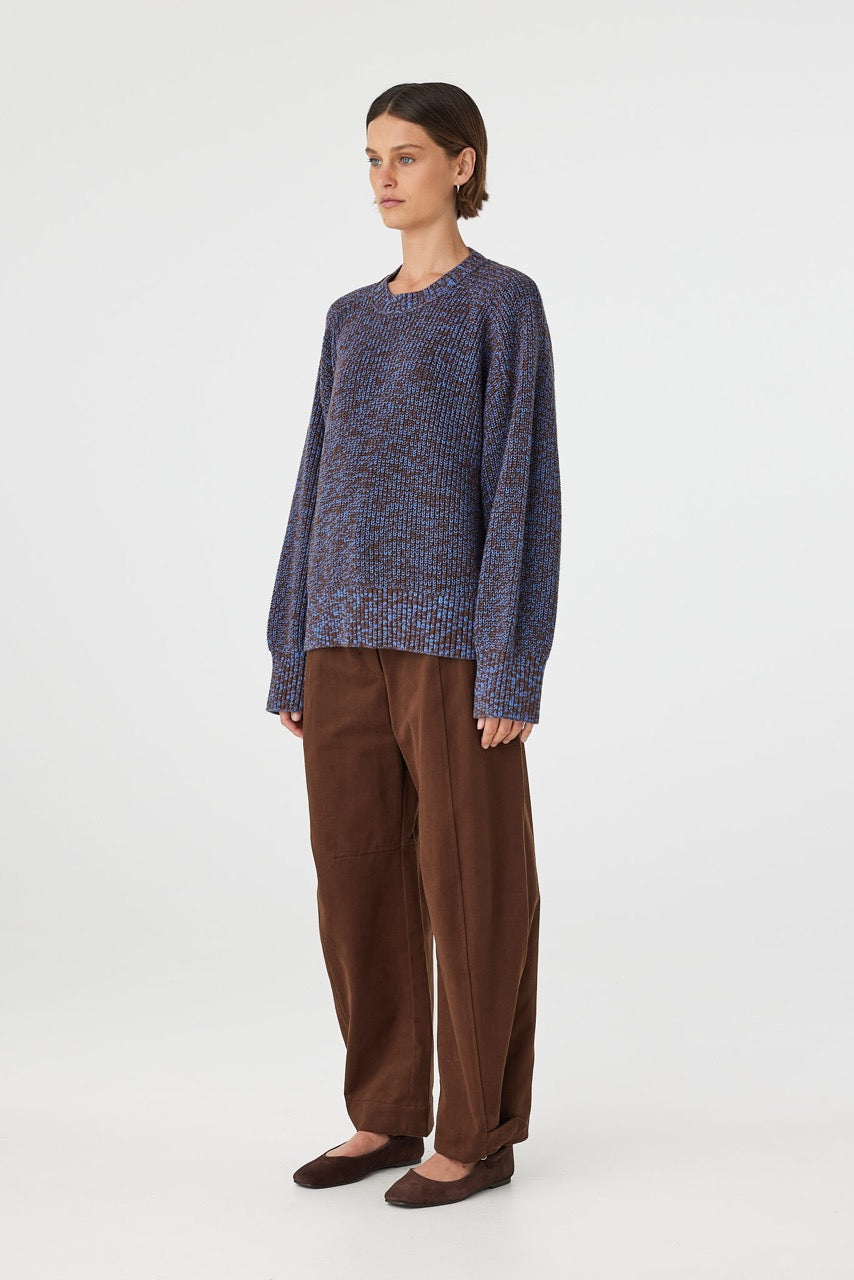 Eames Pant espresso side view showing curved leg shape and relaxed fit through leg styled with textured knit sweater