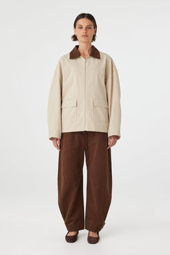 Rory Jacket beige and espresso cotton jacket detail showing front flap pockets and structured fabric