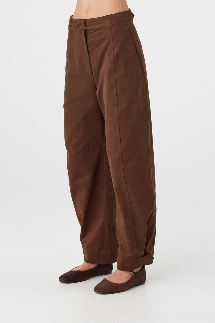 Eames Pant espresso side close-up view showing leg curve and adjustable hem tab detail