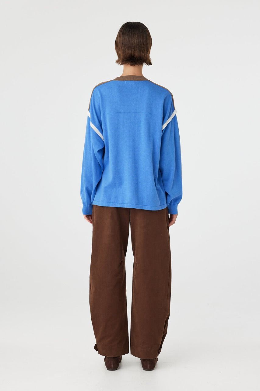 Eden long sleeve tee in royal blue and espresso viewed from back, featuring a clean oversized silhouette and yoke detail through the upper body
