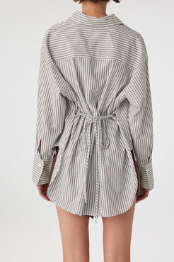 Back view of striped Rae Shirt showing adjustable waist tie detail