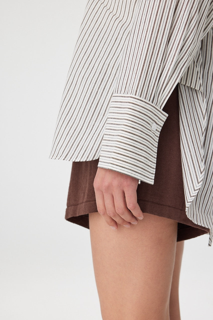 Close view of striped shirt cuff showing oversized cuff detail