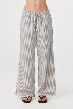 Close front view of striped straight-leg pants showing elastic waistband with drawcord