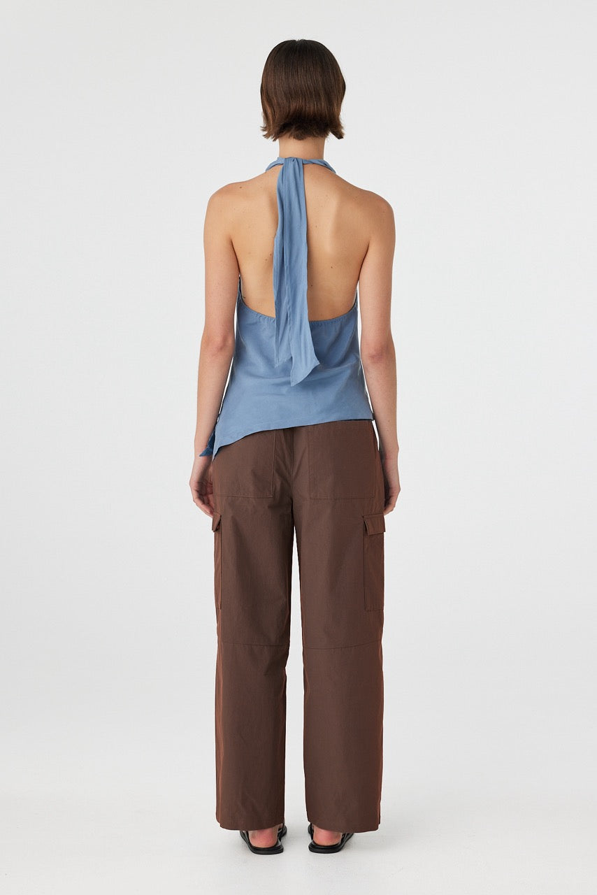 Backless halter top in teal blue with neck tie and open back detail